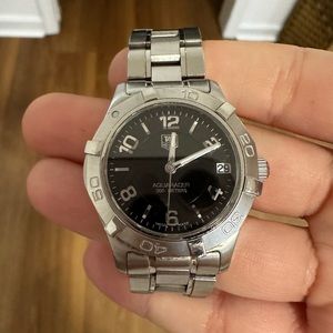 Tag heuer aquaracer watch- there are scratches from usual usage.